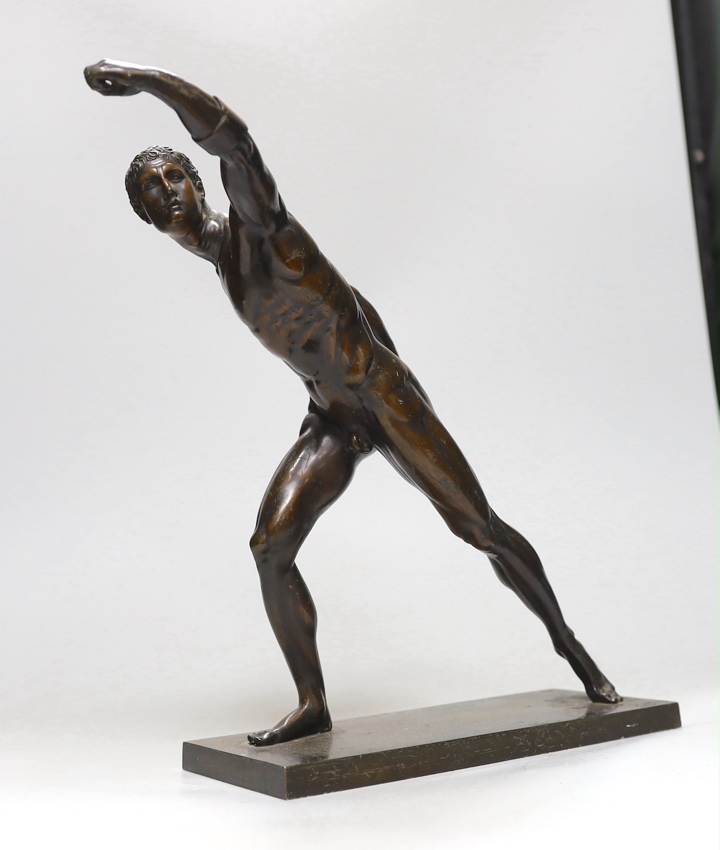 After the Antique, a late 19th/early 20th century bronze figure of an athlete, 32cms high